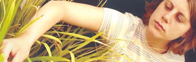 Female student in field of grain