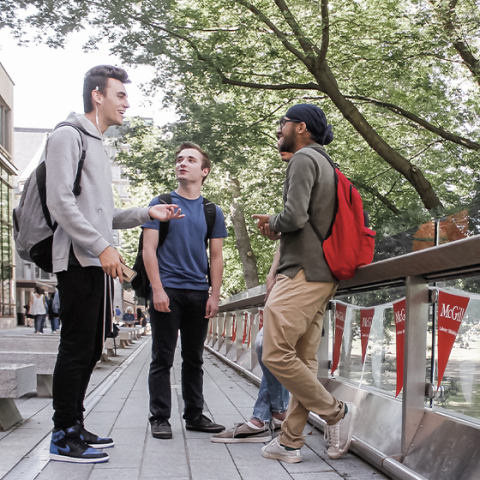 students on campus talking to each other