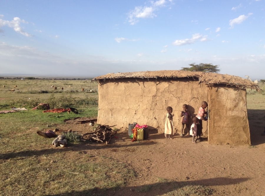 Masaii homestay, Maji Moto, Kenya- Kids standing in front of a mud house
