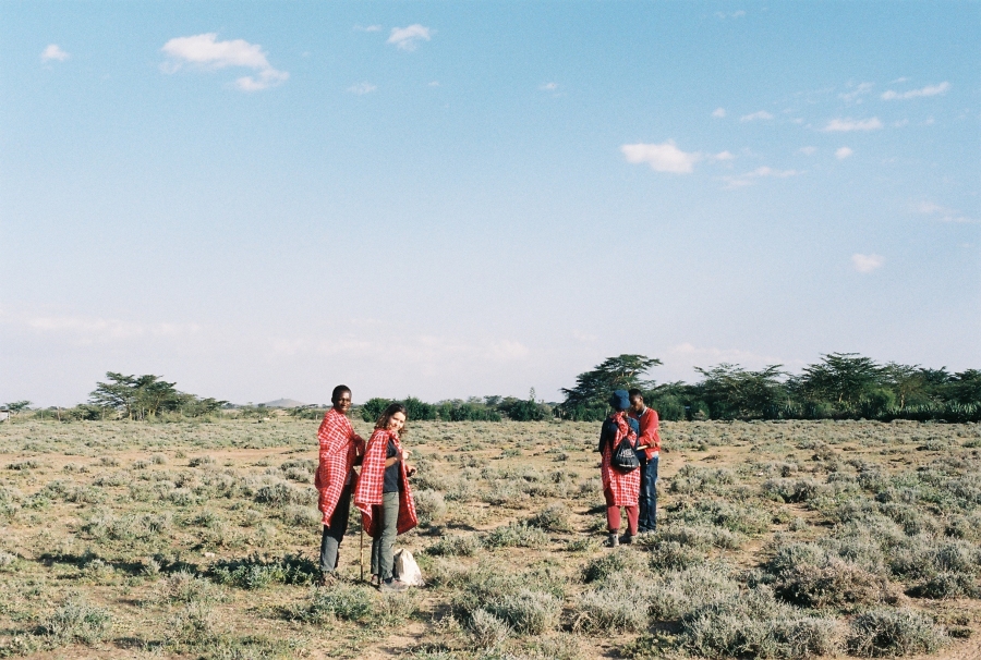 Students in Maji Moto (Kenya), walking with locals from the village. 