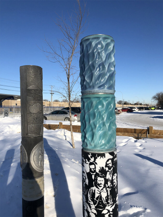 "Use and Occupancy" public artwork at Markham transit stop: tall markers refer to the efforts of Métis people related to land rights