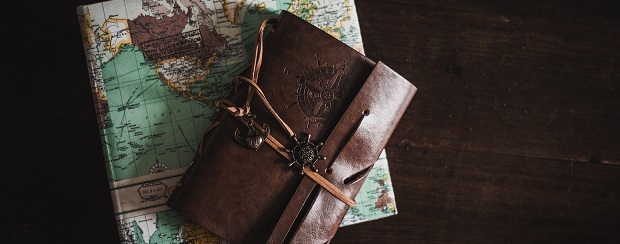 A notebook and a world map
