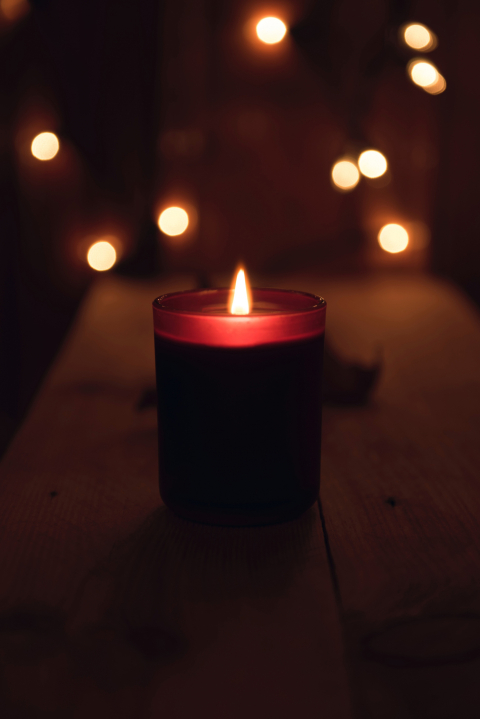 color photo of candles at a church