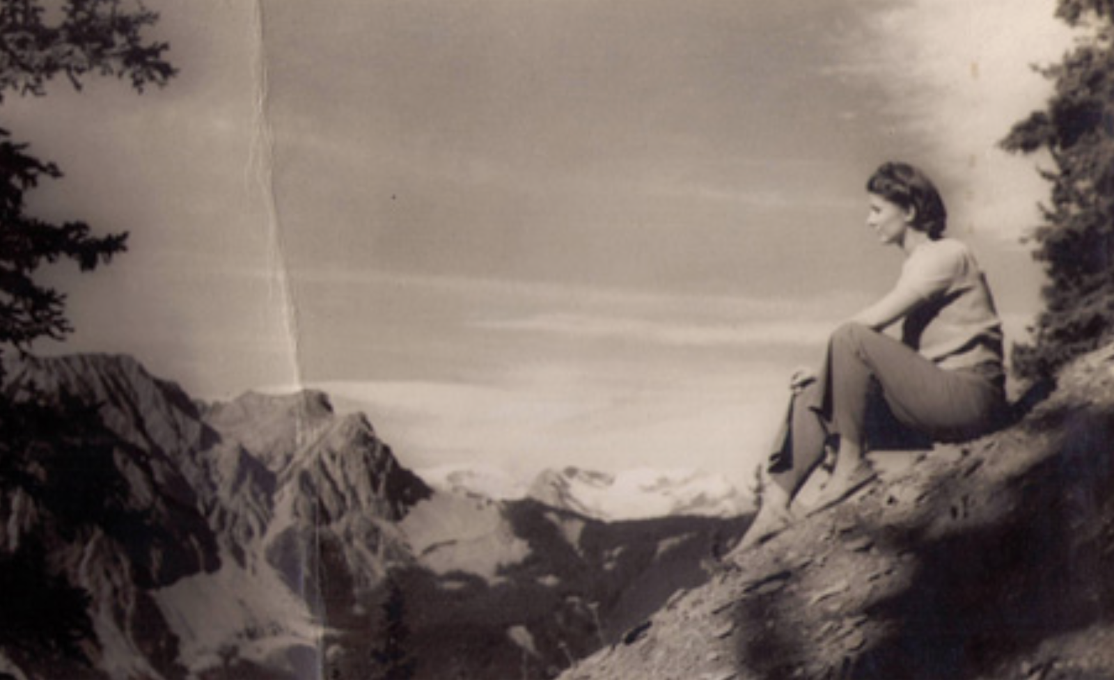Catherine Chard Wisnicki sitting on a hill.