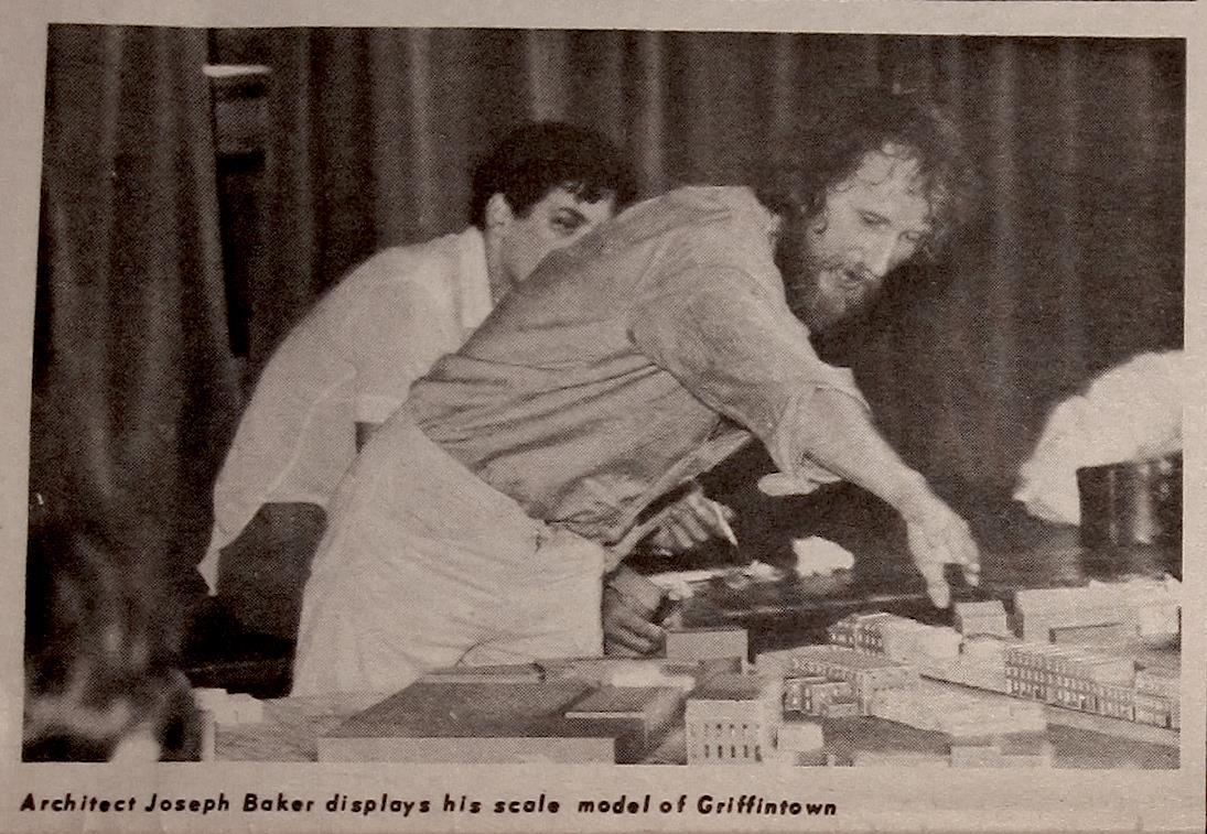 Joe Baker displaying his scale model of Griffintown.