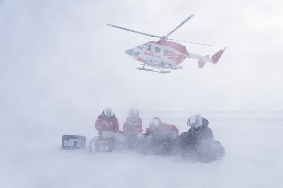 Scientists and helicopter 