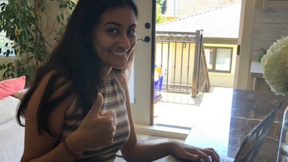 Anika Hundal working on compiling imagery related to one of the director’s new projects at home in Vancouver, British Columbia.