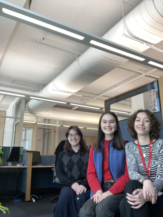 Amélie and two of her fellow interns, Iseline (left) and Emily (middle), in the office.