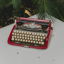 a red color typewriter