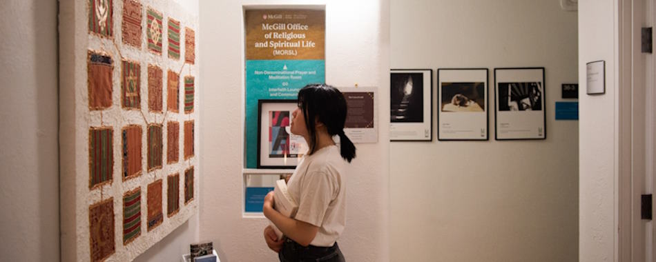 student looking through the exhibit | Image by Owen Eagan