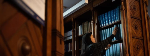 a student browsing a book