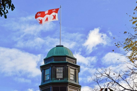 McGill Flag above Arts building
