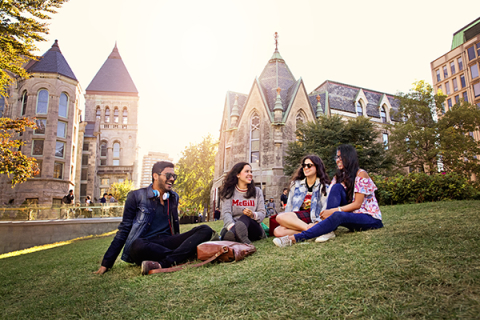 McGill students sitting on the grass on the campus