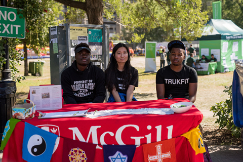 PGSS students man a display on campus