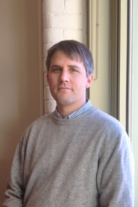 Head shot of Professor Adam Hendricks