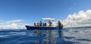 A photograph of students on a boat in Barbados participating in the Barbados Field Study Semester.