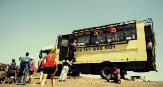 A photograph of students on a bus participating in the East Africa Field Study Semester