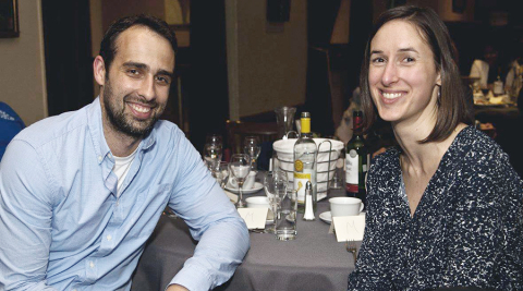 Two people sitting at a table