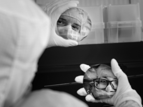 A person working in a microfabrication laboratory