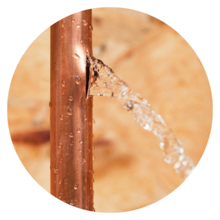 copper pipe with a leak in water