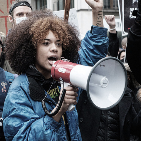 student speaking on megaphone