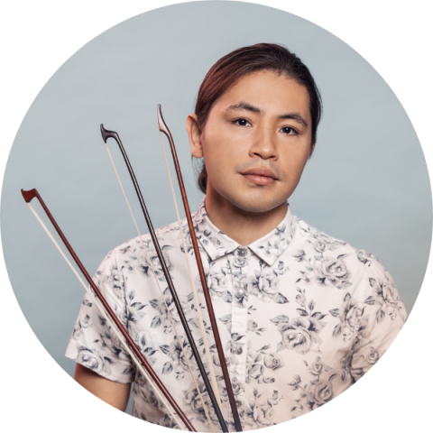 Justin Almazan with three violin bows