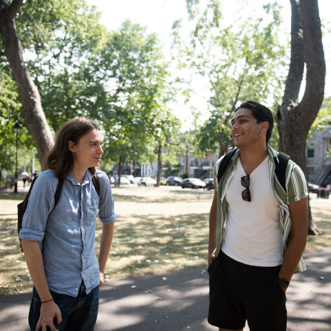 students standing in a park and smiling