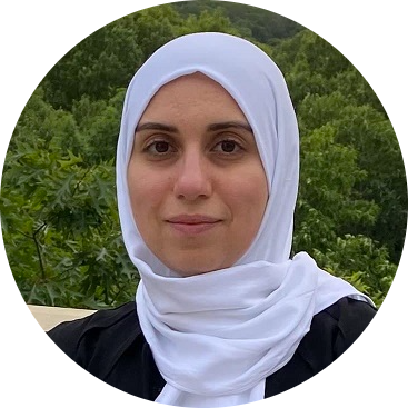 Circular head shot of Elham, a 2021-22 CAnD3 Fellow 