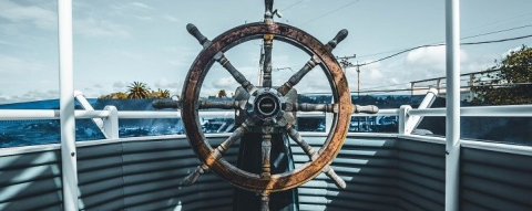 Head-on view of a ship's steering wheel