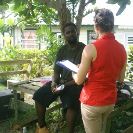 BCWRM student Alicia Suchorski surveying an individual outside 
