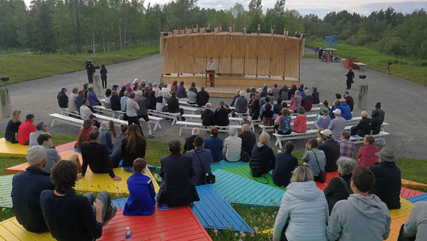 Photo of a reading on the double-sided stage