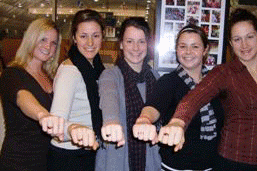 McGill Martlets captain Shauna Denis, Charline Labonté, Catherine Ward, Vanessa Davidson and Cathy Chartrand, show off their new national championship rings
