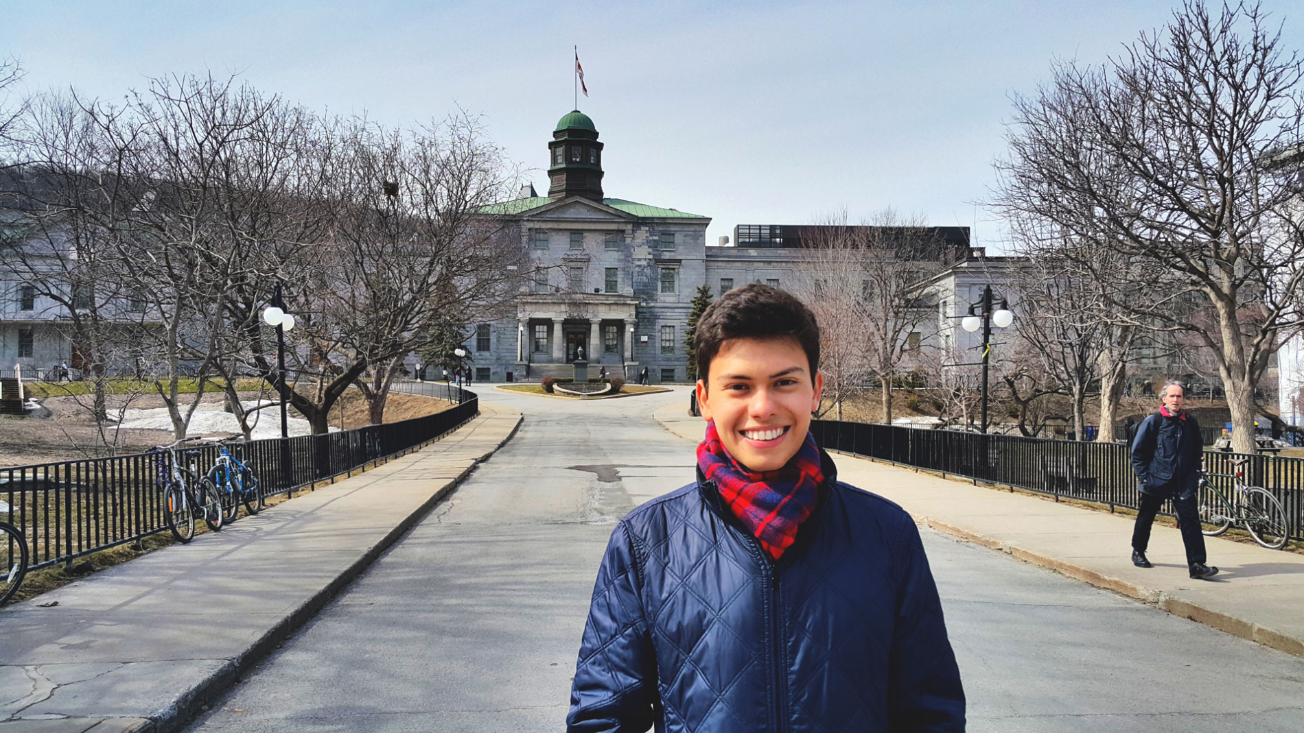 Samuel Balcazar Castellanos in front of the McCall MacBain Arts Building