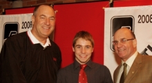 Drew Love, director of athletics & recreation at mcGill, presents swimmer of the year award with Bernard Gagnon of the Quebec Student Sports Federation, to Redmen freshman Steven Bielby of Pointe Claire, Que.