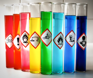 Test tubes with warning labels