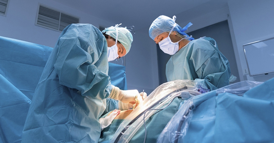 Physicians in operating room