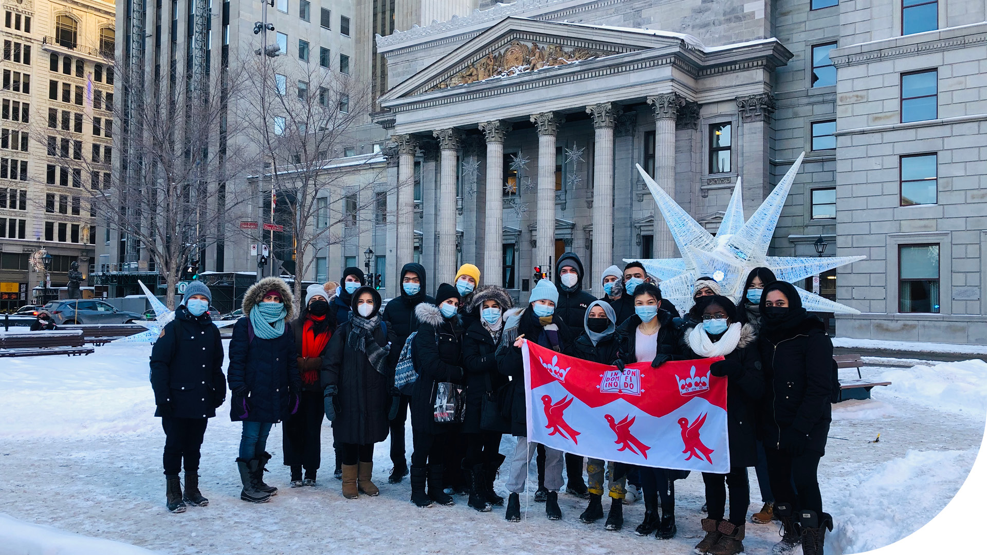 Participants in the Language Acquisition for Refugees program in downtown Montreal on a snowy day