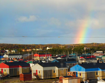 Build Capacity within your community - Town image with rainbow