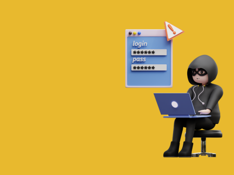 hacker on his laptop accessing someone's login information