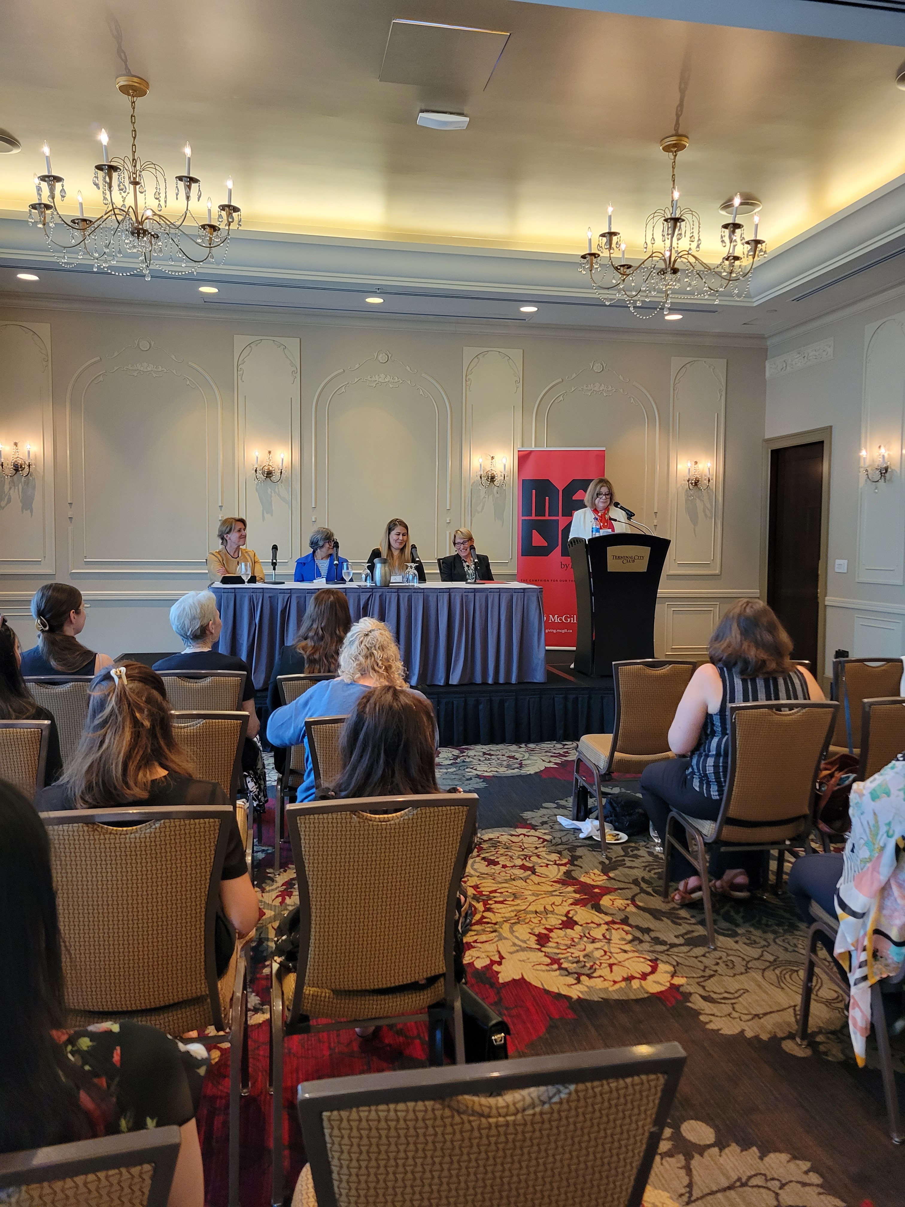 Shaheen Sharif, Safia Amiry, and others presenting on a panel