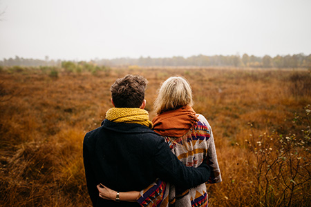 two people looking at the horizon