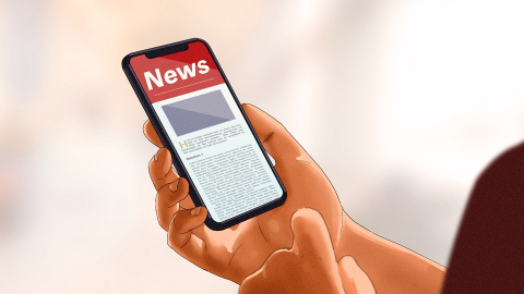 looking at news on a smart phone