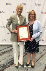 Claire Webster and Diane Weidner accepting the CCAE Award