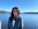 woman with lake in background