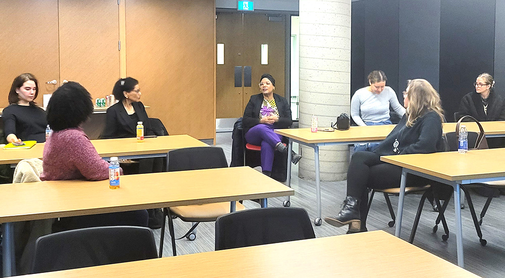 Attendees discussing screening of Remembering Africville