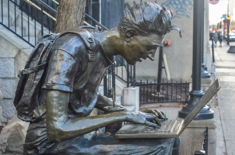 Statue of student near McGill campus