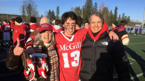 Louis-Charles Généreux (C) celebrates McGill's national lacrosse championship in 2015 with his mother (Myriam Legault) and father (Claude Généreux).