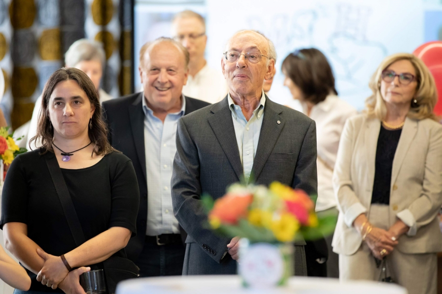 Henry Mintzberg enjoying speeches and messages from colleagues.