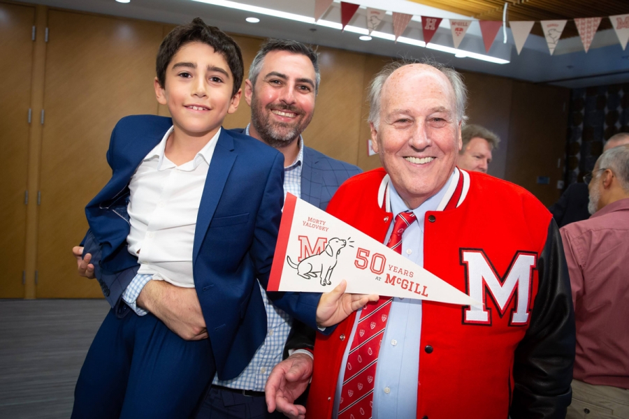 Professor Morty Yalovsky celebrates with son and grandson.
