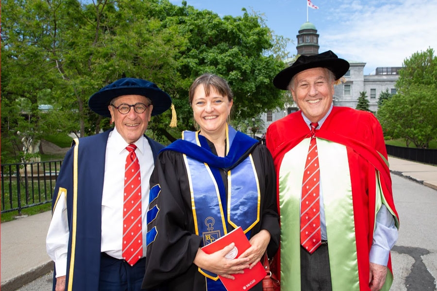 From left to right: Honorary Doctorate recipient Gerald Sheff, Dean Isabelle Bajeux-Besnainou, and Vice-Dean Morty Yalovsky at McGill’s Spring 2018 Convocation.